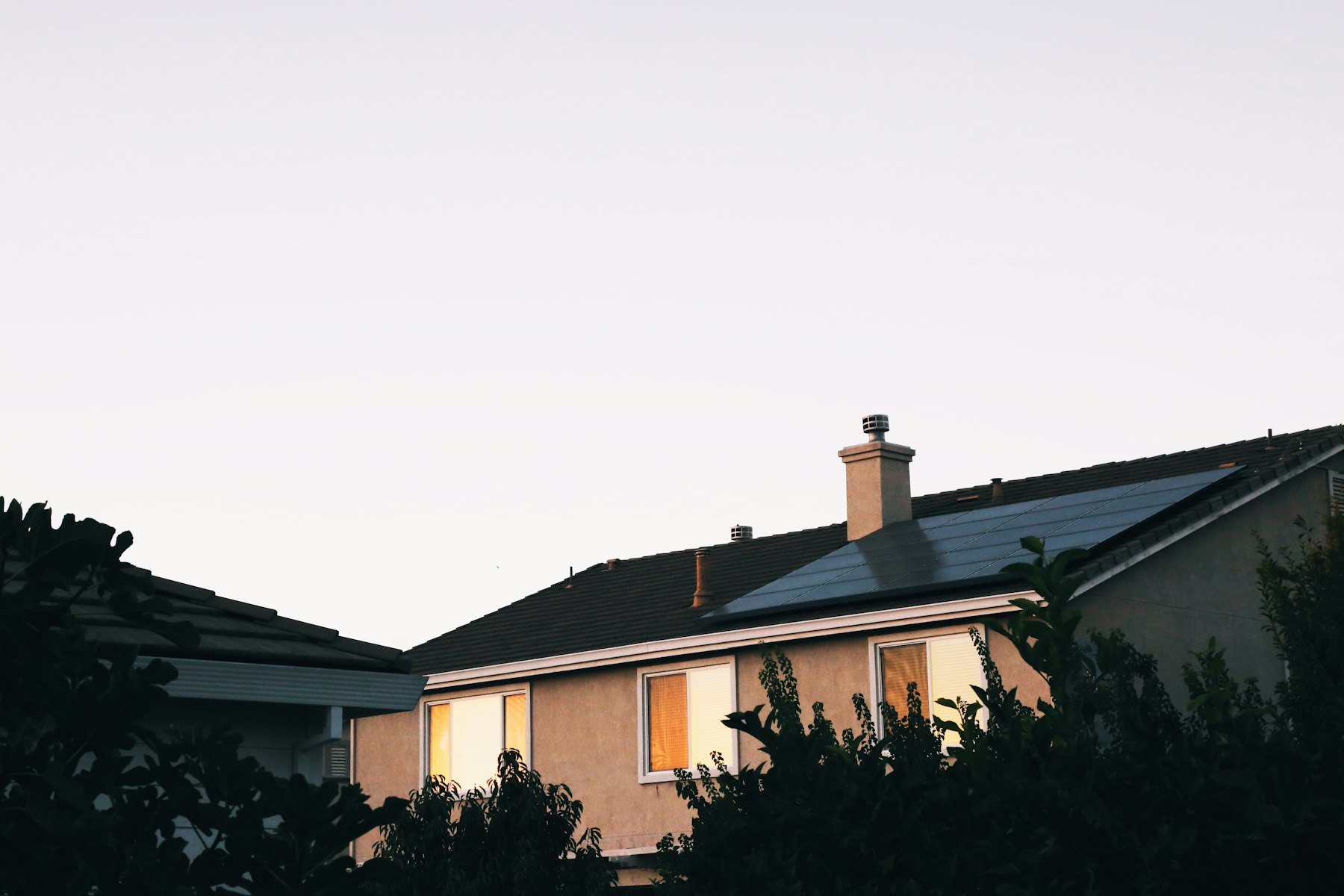 House with gabled roofs at dusk